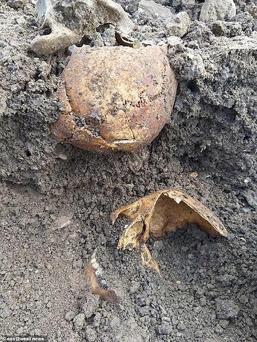 The victims - almost all without visible wounds - were naked and without shoes when they were buried