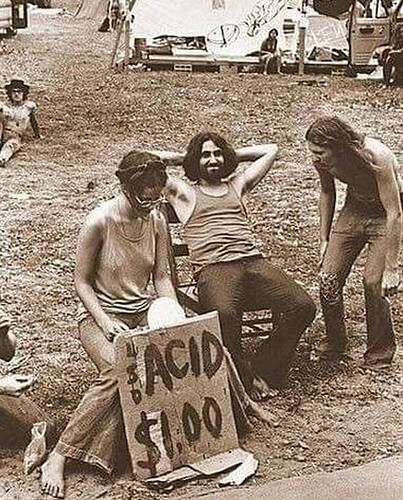 Hippies at the original 1969 Woodstock festival sell LSD for just one dollar