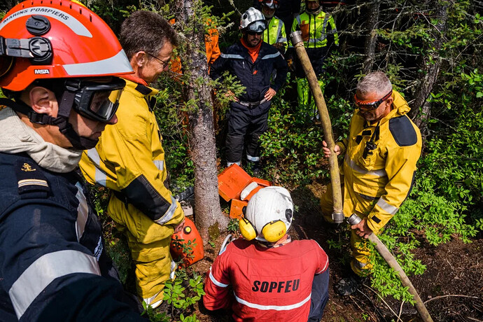 A team with Quebec’s forest fire control agency train a contingent of firefighters from France at a base in Roberval, Quebec, Canada on June 11, 2023. (Renaud Philippe/The New York Times)