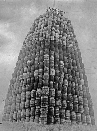 A tower built with barrels of alcohol, which will be destroyed later during the prohibition, 1929