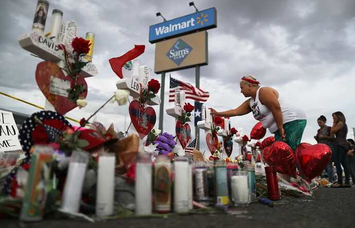 A makeshift memorial forms for victims outside Walmart, near the scene of a mass shooting in El Paso, Texas, in 2019.