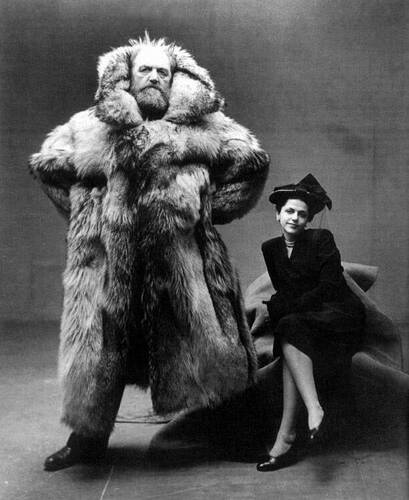 Arctic explorer Peter Freuchen stands next to his third wife, Dagmar Freuchen-Gale, in 1947. The fearless Freuchen is wearing a polar bear coat made from a bear he killed himself