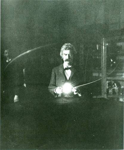 Mark Twain in Nikola Tesla's lab circa 1894. The writer and the inventor were friends — Tesla had read Twain's books, and Twain was fascinated with technology.
