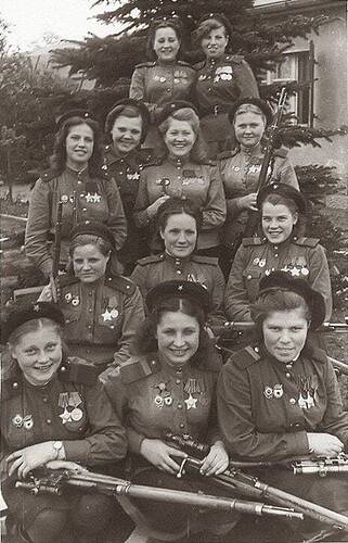 A group of beaming Soviet snipers during World War II. The Soviet Union trained about 2,000 women as snipers. One of them, Lyudmila Pavlichenko, killed 300 people single-handedly