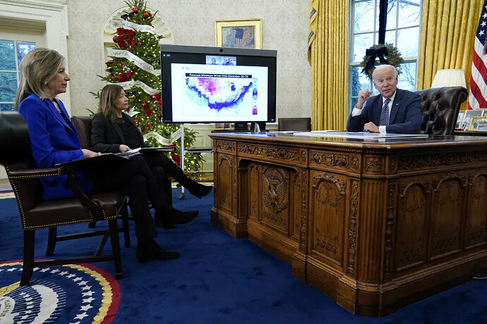 Julie Chavez Rodriguez, second from left, with President Biden