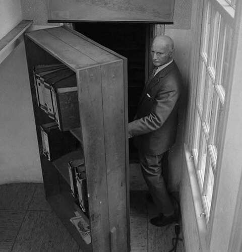 Anne Frank’s father Otto revisits the attic entrance where he and his family hid for two years before their betrayal. Amsterdam. 1960
