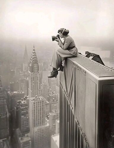Photographer Margaret Bourke-White taking a photo from the top of a Building, 1935