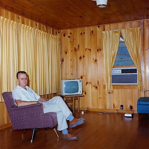 A man and his paneled den, 1965.