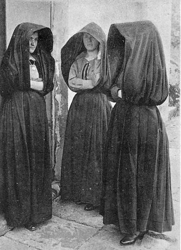 Portuguese women from the Azores Islands in their tradition hooded capes.