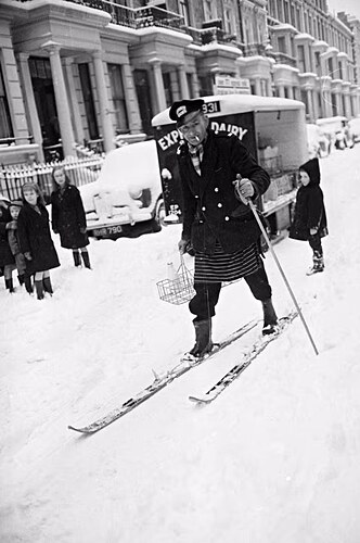 history A milkman doing his deliveries on skis at Earl's Court, London.