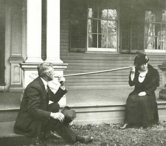 History 1890 A Couple Uses a Courting Stick, which is a long hollow stick that allowed couples to whisper sweet nothings to each other