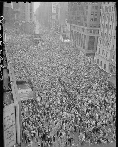 Jubilant crowds pack Times Square in New York City following the end of World War II
