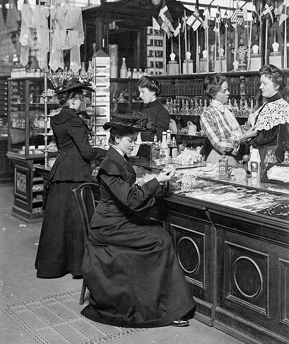 history Women shopping for perfumes and jewelry at Illum department store in Copenhagen, Denmark. 1904