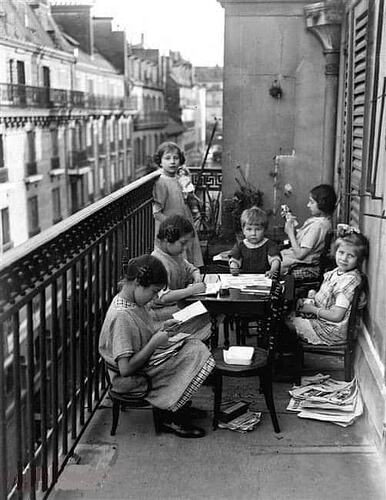 Kids playing on a balcony in Paris. (1913)