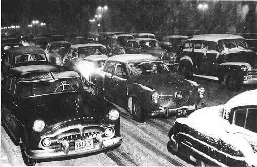 History Vintage cars in blizzard traffic on West Side Highway.